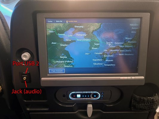 Ecran d'un siège d'un avion longue distance